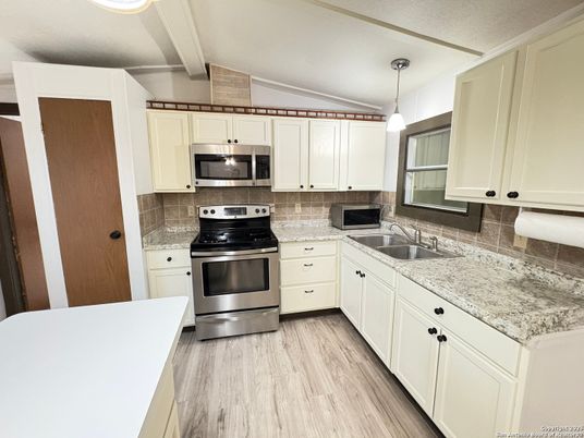 Interior, Kitchen, Pendant Lights, Stainless Steel Appliances, Wood Texture Flooring