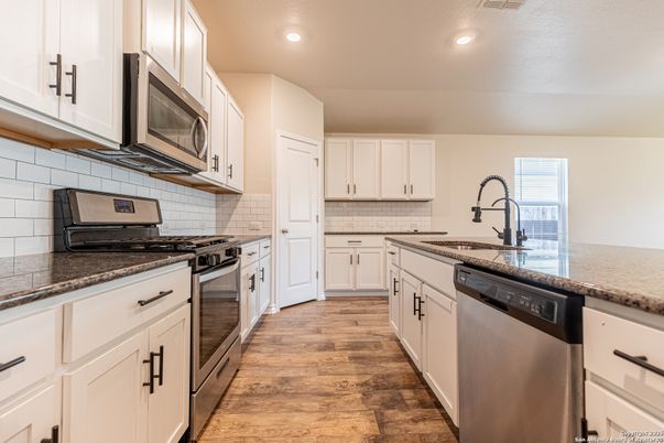 Interior, Kitchen, Recessed Lighting, Stainless Steel Appliances, Wood Texture Flooring