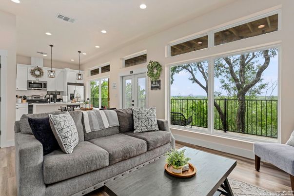 Dining room, Interior, Kitchen, Living room, Pendant Lights, Recessed Lighting, Stainless Steel Appliances, Wood Texture Flooring