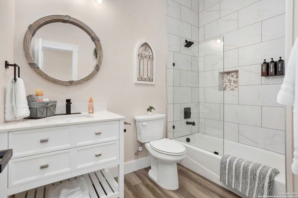 Bathroom, Glass Shower, Interior, Marble Walls, Wood Texture Flooring
