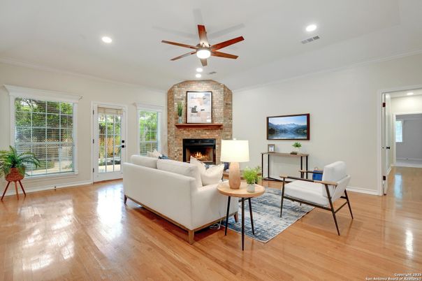 Fireplace, Interior, Living room, Recessed Lighting, Stone Walls, Wood Texture Flooring