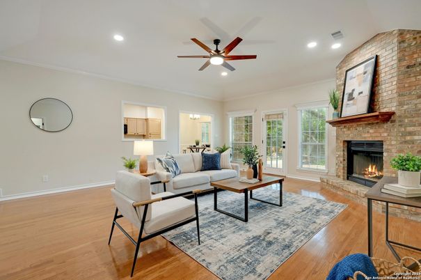 Fireplace, Interior, Living room, Recessed Lighting, Stone Walls, Wood Texture Flooring