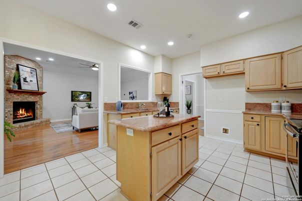Fireplace, Interior, Kitchen, Living room, Recessed Lighting, Wood Texture Flooring