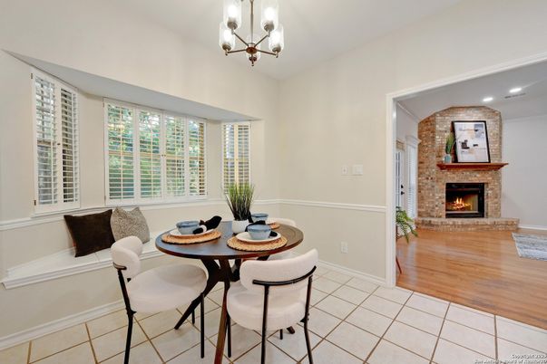 Chandelier, Dining room, Fireplace, Interior, Recessed Lighting, Wood Texture Flooring