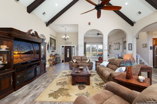 Chandelier, Interior, Living room, Recessed Lighting, Wooden Beams, Wood Texture Flooring