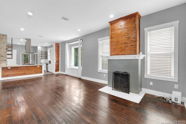Empty room, Fireplace, Interior, Kitchen, Recessed Lighting, Wood Texture Flooring