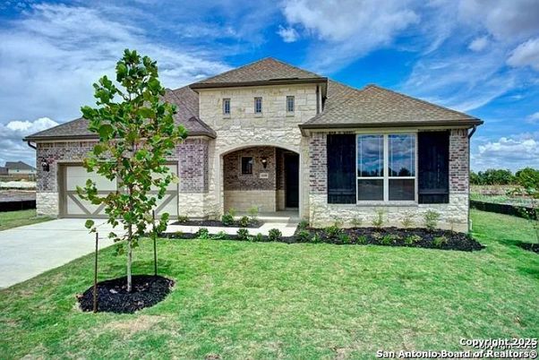 Attached, Backyard, Exterior, Facade, Brick Facade, French Provincial