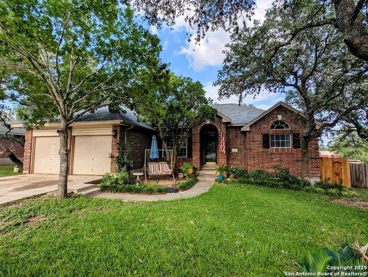 Attached, Backyard, Exterior, Facade, Brick Facade, Ranch