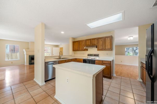 Fireplace, Interior, Kitchen, Recessed Lighting, Wood Texture Flooring