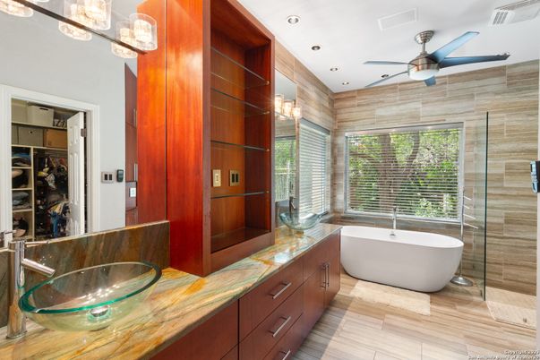 Bathroom, Dual Sink Vanities, Free Standing Baths, Glass Shower, Interior, Recessed Lighting, Wood Texture Flooring