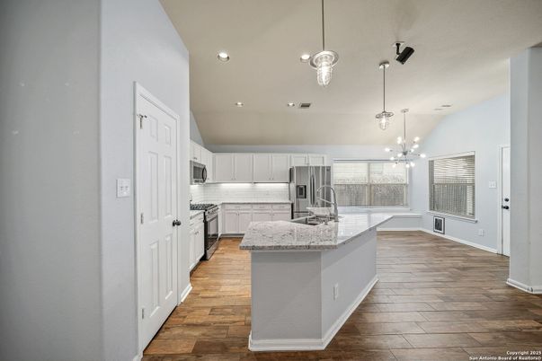 Interior, Kitchen, Pendant Lights, Recessed Lighting, Stainless Steel Appliances, Wood Texture Flooring
