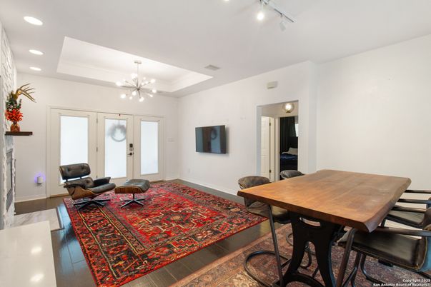 Dining room, Fireplace, Interior, Pendant Lights, Recessed Lighting, Wood Texture Flooring