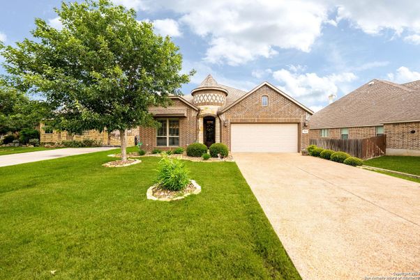 Attached, Backyard, Exterior, Facade, Brick Facade, Brick Traditional
