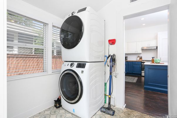 Interior, Kitchen, Recessed Lighting, Washer, Wood Texture Flooring