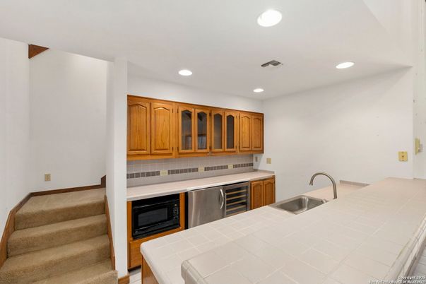 Interior, Kitchen, Recessed Lighting, Stainless Steel Appliances, Tile Countertops