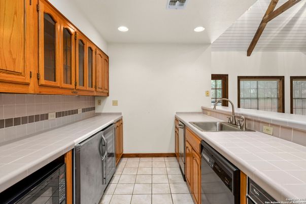 Interior, Kitchen, Recessed Lighting, Tile Countertops
