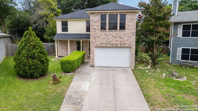 Attached, Exterior, Facade, Brick Facade, Raised Ranch