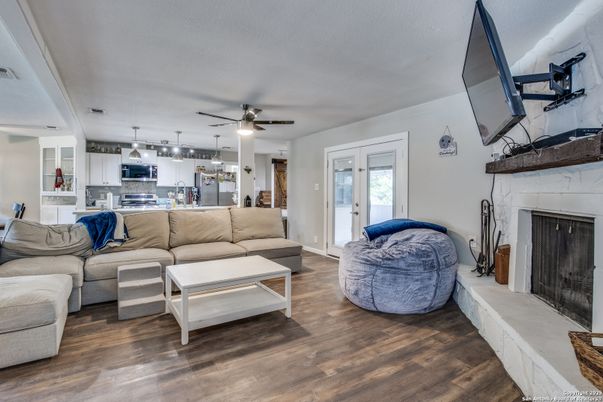Fireplace, Interior, Kitchen, Living room, Stainless Steel Appliances, Wood Texture Flooring