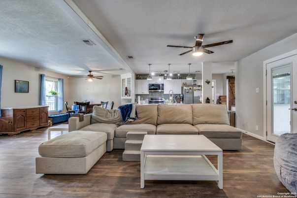 Dining room, Interior, Kitchen, Living room, Recessed Lighting, Stainless Steel Appliances, Wood Texture Flooring