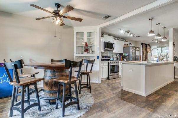 Dining room, Interior, Kitchen, Pendant Lights, Stainless Steel Appliances, Wood Texture Flooring