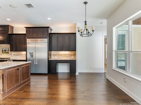 Chandelier, Interior, Kitchen, Pendant Lights, Recessed Lighting, Stainless Steel Appliances, Wood Texture Flooring