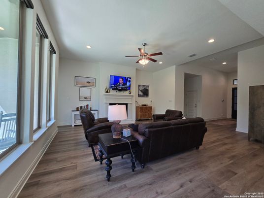 Fireplace, Interior, Living room, Recessed Lighting, Wood Texture Flooring