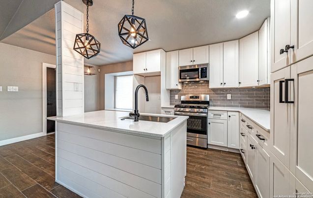 Interior, Kitchen, Pendant Lights, Recessed Lighting, Stainless Steel Appliances, Wood Texture Flooring