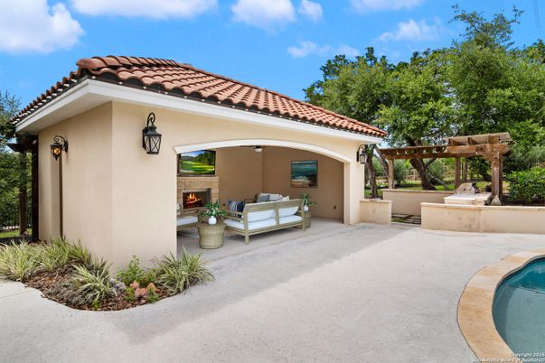 Exterior, Fireplace, Pool
