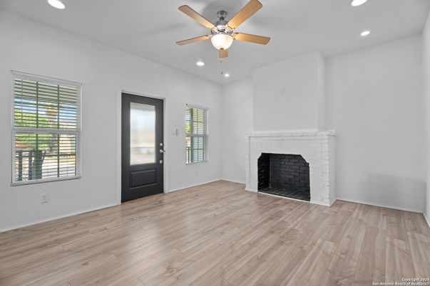 Empty room, Fireplace, Interior, Recessed Lighting, Wood Texture Flooring
