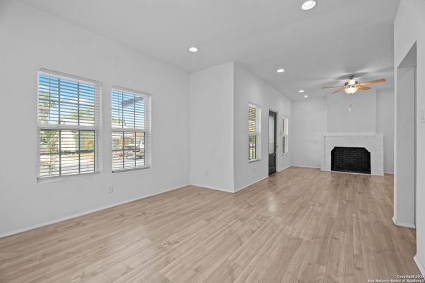 Empty room, Fireplace, Interior, Recessed Lighting, Wood Texture Flooring
