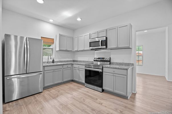 Interior, Kitchen, Recessed Lighting, Stainless Steel Appliances, Wood Texture Flooring