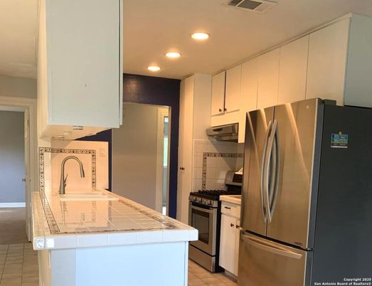 Interior, Kitchen, Recessed Lighting, Tile Countertops