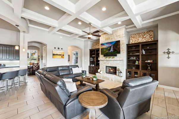 Fireplace, Interior, Living room, Pendant Lights, Recessed Lighting, Stone Walls, Wood Texture Flooring