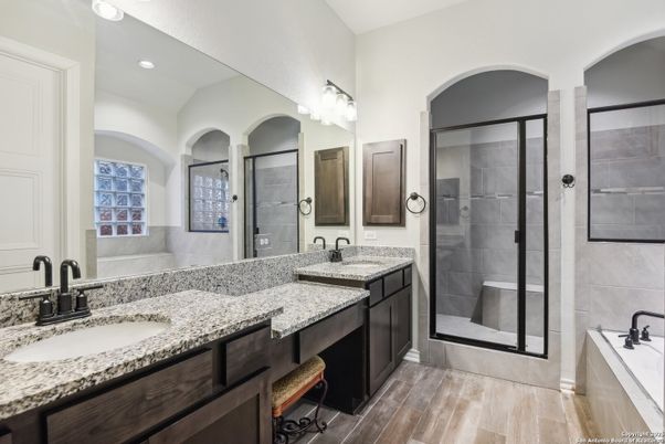 Bathroom, Dual Sink Vanities, Glass Shower, Interior, Recessed Lighting, Wood Texture Flooring