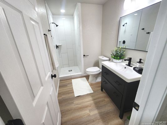 Bathroom, Dual Sink Vanities, Interior, Recessed Lighting, Wood Texture Flooring