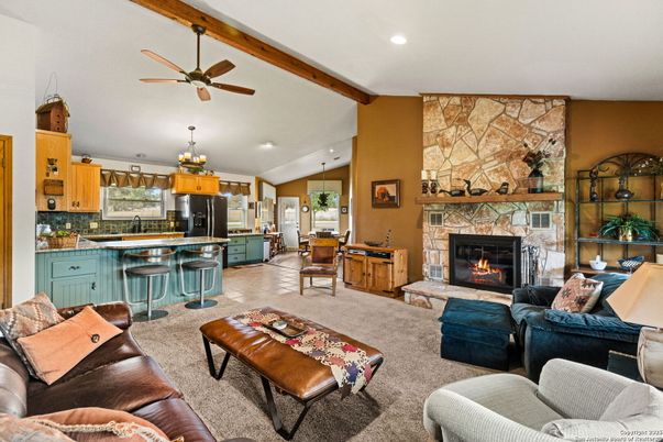 Chandelier, Fireplace, Interior, Kitchen, Living room, Recessed Lighting, Stone Walls