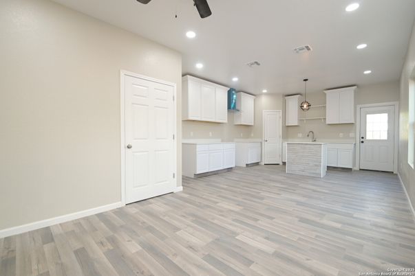 Empty room, Interior, Kitchen, Pendant Lights, Recessed Lighting, Wood Texture Flooring