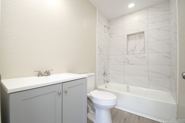 Bathroom, Interior, Marble Walls, Recessed Lighting, Wood Texture Flooring