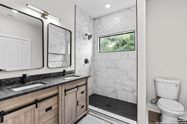 Bathroom, Dual Sink Vanities, Glass Shower, Interior, Marble Walls, Recessed Lighting