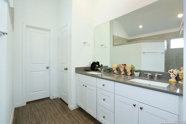 Bathroom, Dual Sink Vanities, Interior, Recessed Lighting, Wood Texture Flooring