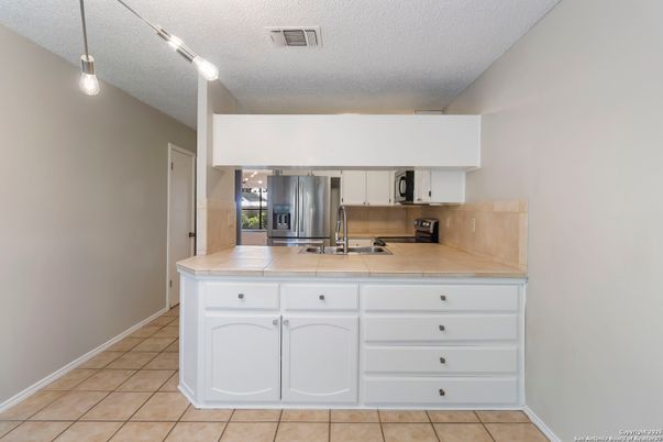 Interior, Kitchen, Stainless Steel Appliances, Tile Countertops