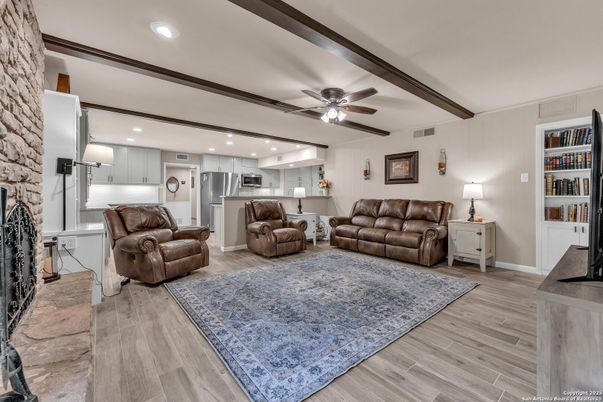 Interior, Kitchen, Living room, Recessed Lighting, Stainless Steel Appliances, Stone Walls, Wooden Beams, Wood Texture Flooring
