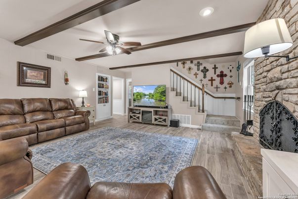 Fireplace, Interior, Living room, Recessed Lighting, Stone Walls, Wooden Beams, Wood Texture Flooring