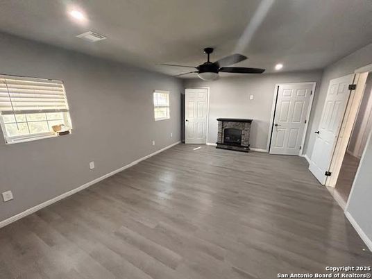 Empty room, Fireplace, Interior, Recessed Lighting, Wood Texture Flooring
