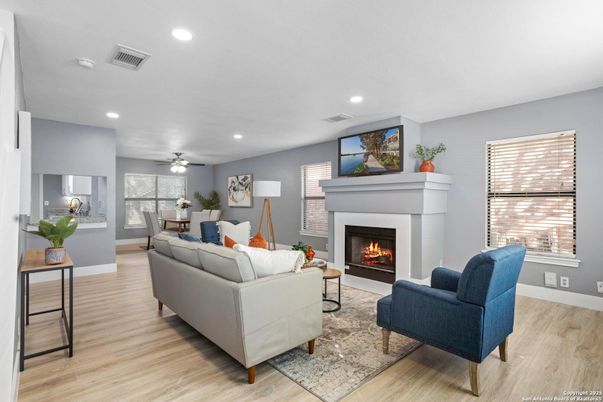 Dining room, Fireplace, Interior, Living room, Recessed Lighting, Wood Texture Flooring