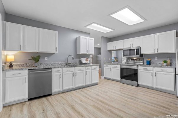 Interior, Kitchen, Recessed Lighting, Stainless Steel Appliances, Wood Texture Flooring