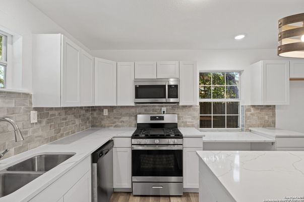 Interior, Kitchen, Recessed Lighting, Stainless Steel Appliances, Wood Texture Flooring