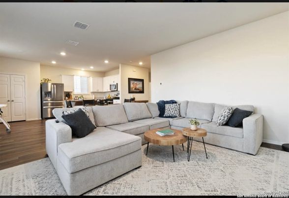 Dining room, Interior, Kitchen, Living room, Recessed Lighting, Stainless Steel Appliances, Wood Texture Flooring