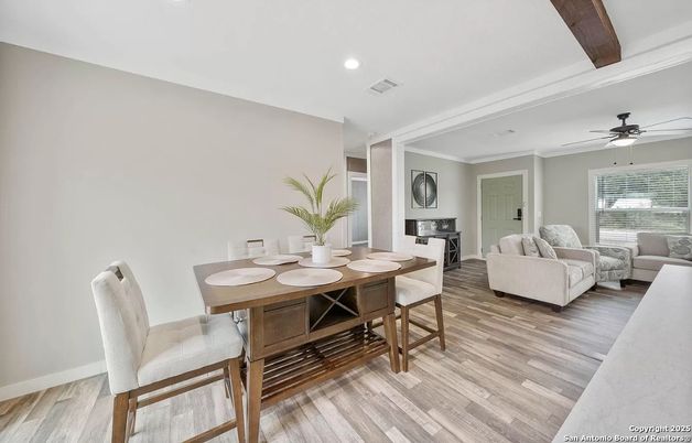Dining room, Fireplace, Interior, Living room, Recessed Lighting, Wood Texture Flooring