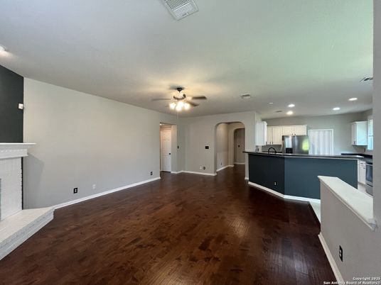 Fireplace, Interior, Kitchen, Recessed Lighting, Wood Texture Flooring